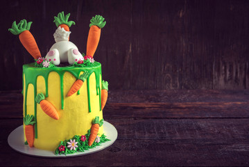 Easter cake served on the wooden background