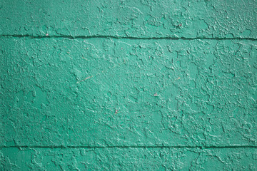 Texture of the old cracked turquoise color paint