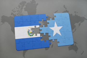 Fototapeta premium puzzle with the national flag of el salvador and kuwait on a world map