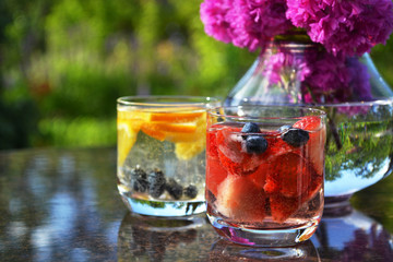 Infused fruit water with mix of  orange, honeysuckle berries and strawberry