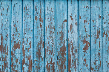 Fototapeta na wymiar Blue vintage wood background with peeling paint vertical