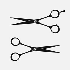 set of hairdressing scissors. Silhouettes of scissors. Vector