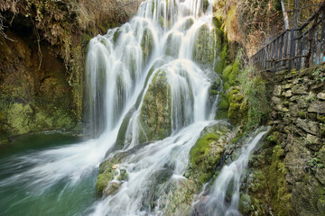 Fototapeta na wymiar Silky waterfall in Tobera village, Burgos, Castile and Leon, Spain.