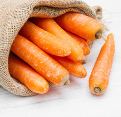 canvas sack full of carrot