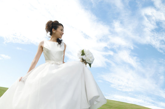 Young woman wearing a wedding dress