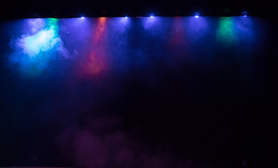 scene, stage light with colored spotlights and smoke