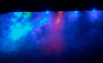 scene, stage light with colored spotlights and smoke