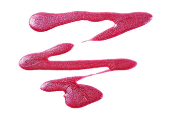 Spilled pink nail polish isolated on white background
