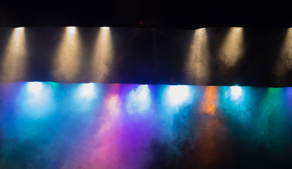 scene, stage light with colored spotlights and smoke