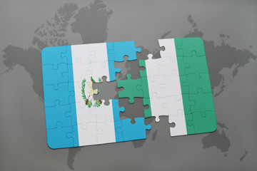 puzzle with the national flag of guatemala and nigeria on a world map