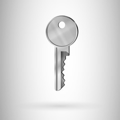 Silver metal key ey on a grey background.