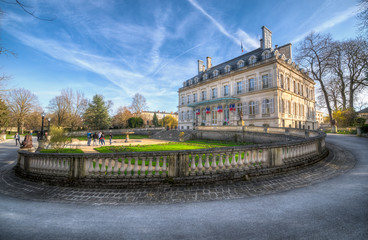 Fototapeta na wymiar Beautiful Epernay town hall building and its garden in spring, France