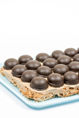 Preparing cooking chocolate cake over white background