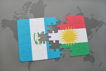 puzzle with the national flag of guatemala and kurdistan on a world map