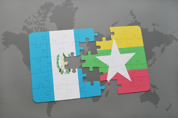 puzzle with the national flag of guatemala and myanmar on a world map
