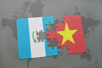 puzzle with the national flag of guatemala and vietnam on a world map