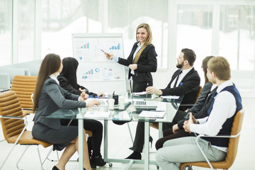  business team gives a presentation of a new financial project for the business partners of the company