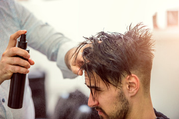 Fototapeta premium Man Hair Styling with Hair-spray
