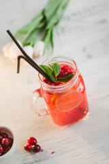 Fresh drink lemonade orange strawberry cranberries