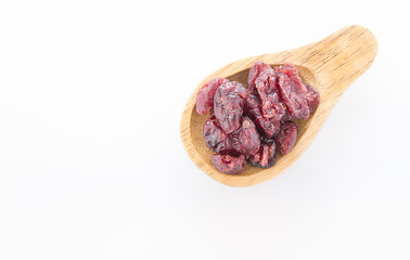 Dried cranberries isolated on white background (Vaccinium myrtillus)