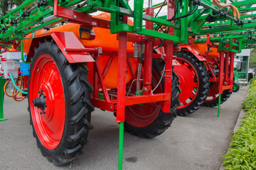 Elements of agricultural machinery at the exhibition closeup