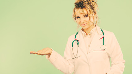 Female doctor showing copy space.