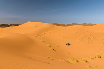 Fototapeta na wymiar Safari car in the desert, Ouzina, Morocco