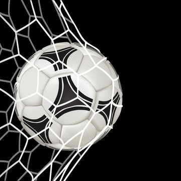 Realistic soccer ball in net isolated on black background.
