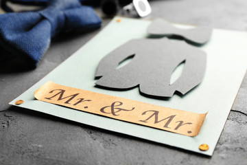 Gay marriage card invitation on gray background