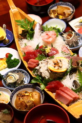 Sashimi boat (assortment of sashimi on a boat) with Japanese Traditional Food