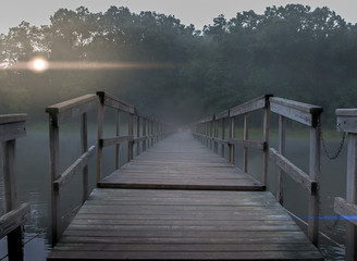 Fototapeta premium foggy footbridge sunset