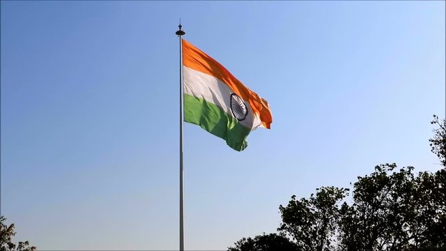 Tiranga (Tri coloured) the national flag of India hoisted in central park, Rajiv Chowk, New Delhi, India