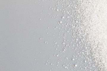 Salt on gray background