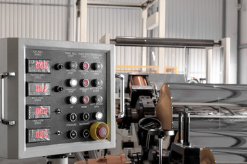 the control panel at the plant for the production of cellophane and polypropylene closeup. the...