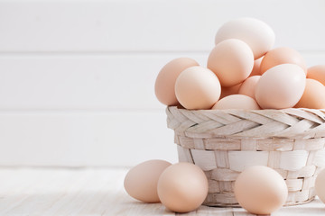 eggs on white wooden background