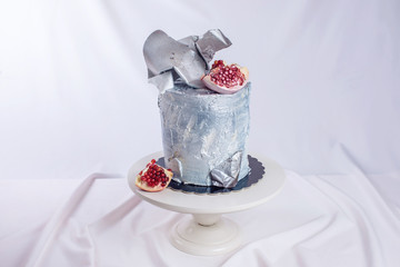 Wedding cake decorated in loft style, decorated with metal plates