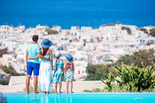 Family of four with beautiful view in luxury hotel