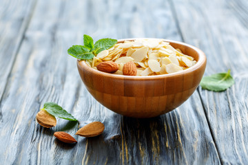 Bowl with almond flakes and mint.
