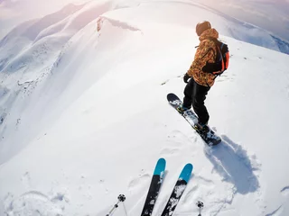 Deurstickers freeriders on steep slope ready to drop in fresh powder snow © ronstik