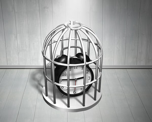 Alarm clock in the silver cage