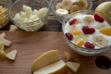 yogurt with fruits orange bananna pineapple apple