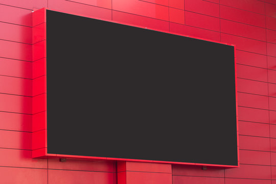 Outdoor Digital Display On Red Wall
