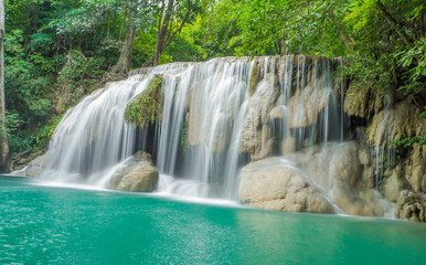 Fototapeta na wymiar Landscape photo, Waterfall in autumn forest at Erawan waterfall National Park, Thailand