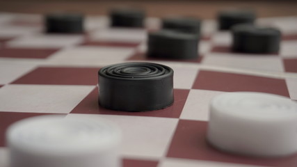 Obraz na płótnie Canvas Close-up photo of the checkers board game