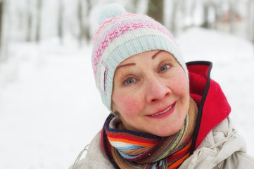 Portrait of a woman in a winter park