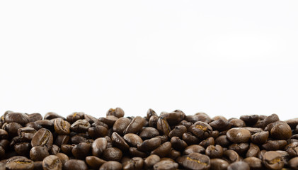 Coffee beans isolated on white background with copyspace for text. Coffee background or texture concept.