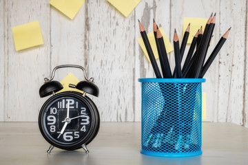 Education concept, Equipment and supplies for work on old wood background.