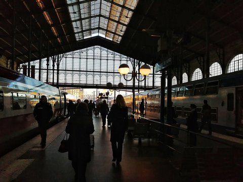 people walking in the train station