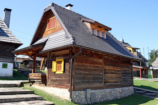 wooden cottages in mountain village