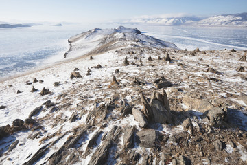 Stone pyramids for spirits. Ogoi island. Baikal lake